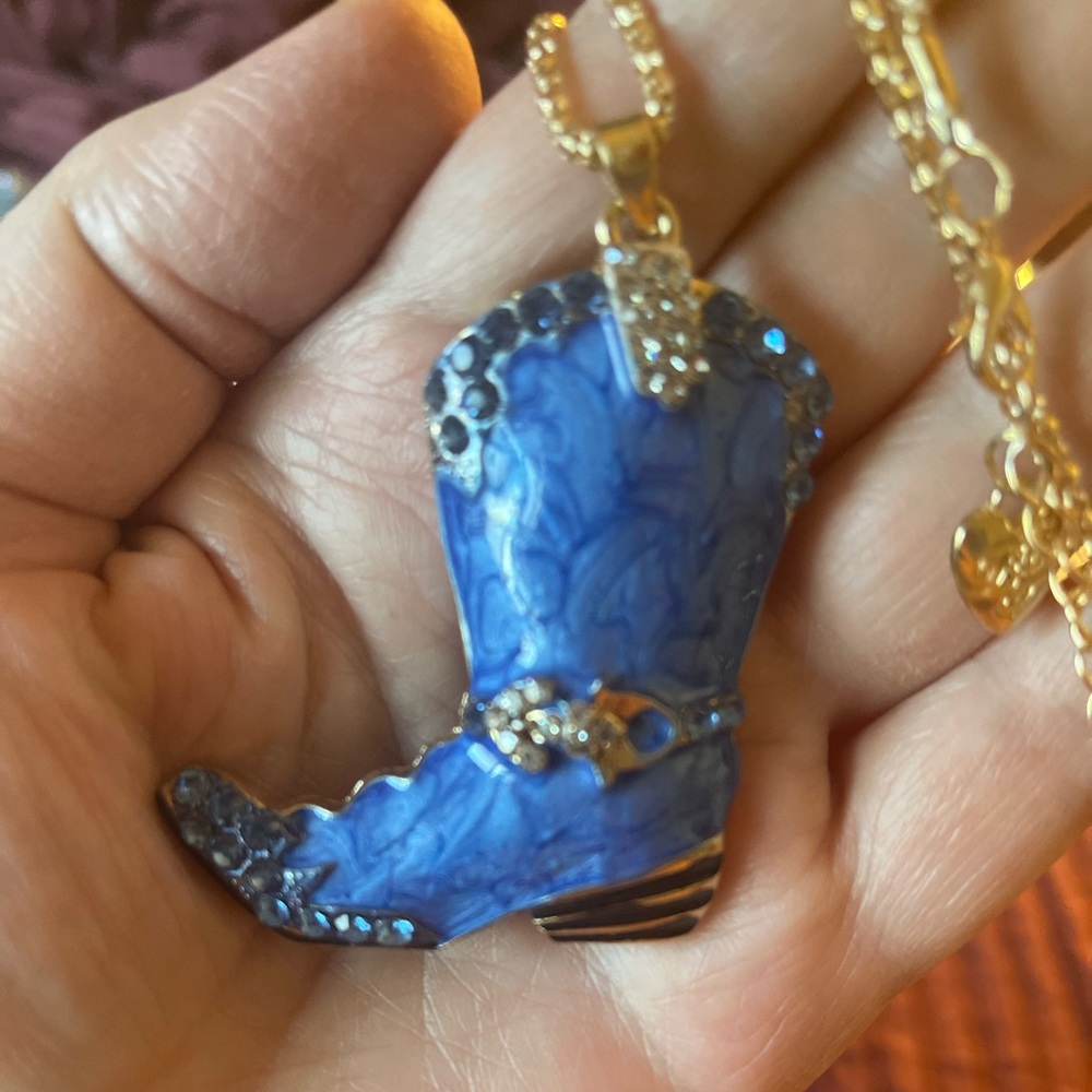 Boot necklace in dark blue comes on 17” necklace.